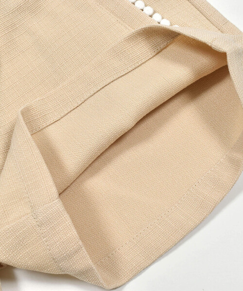 BeBe Petits Pois Vert(ベベプチポワヴェール)の「【店舗限定】無地ツイードポンポンつきキュロット(95~150cm)(その他パンツ・キッズ・ネイビー/ベージュ・120cm/130cm/140cm/100cm/150cm/110cm/95cm)」の8枚目の写真