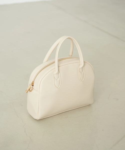 earth music&ecology(アースミュージックアンドエコロジー)の「ラウンドミニボストンバッグ*(トートバッグ・レディース・ブラック/ベージュ/アイボリー・FREE)」の1枚目の写真