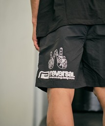 reversal.dogi.design.works（リバーサル・ドーギ・デザイン・ワークス）の「＜reversal/リバーサル＞WARFIELD EDITION PEACE NYLON SHORTS（その他パンツ）」