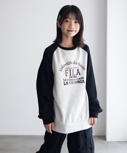 FILA(フィラ)の「【 ガールズ 】FILA ラグラン配色チュニック トレーナー(スウェット・キッズ・ブラック/サックスブルー・120/130/140/150/160)」の1枚目の写真
