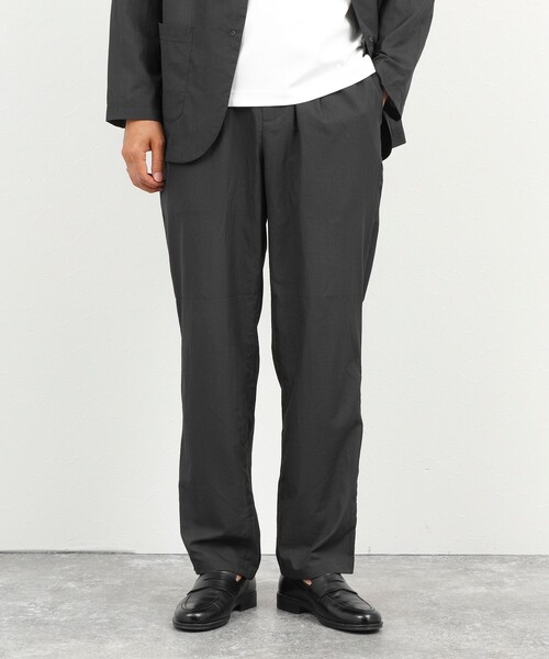 NOLLEY’S(ノーリーズ)の「《ビジカジ/セットアップ対応》軽量シアーリップストップ イージーパンツ 26SS(その他パンツ・メンズ・ネイビー/チャコールグレー・M/S/XL/L)」の1枚目の写真