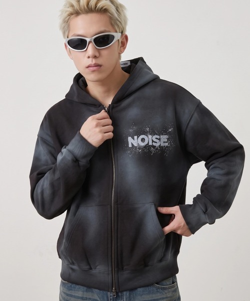 A'gem(エージェム)の「A'GEM/9 × .kom 『A'gem/エージェム』SPRAY ZIP-UP HOODIE/スプレージップアップパーカー(パーカー・メンズ・ブラック/アイボリー・FREE)」の2枚目の写真