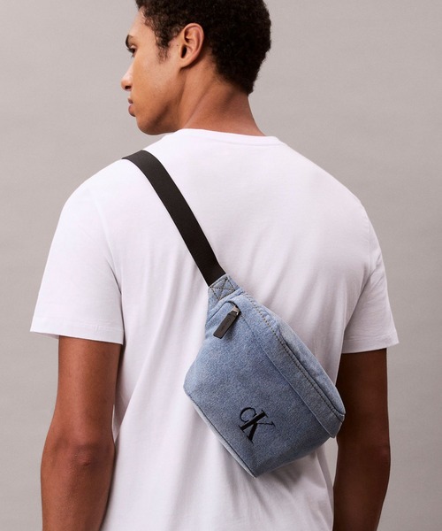 Calvin Klein(カルバン・クライン)の「デニム ウエストバッグ(ボディバッグ/ウエストポーチ・メンズ・ブルー・FREE)」の1枚目の写真