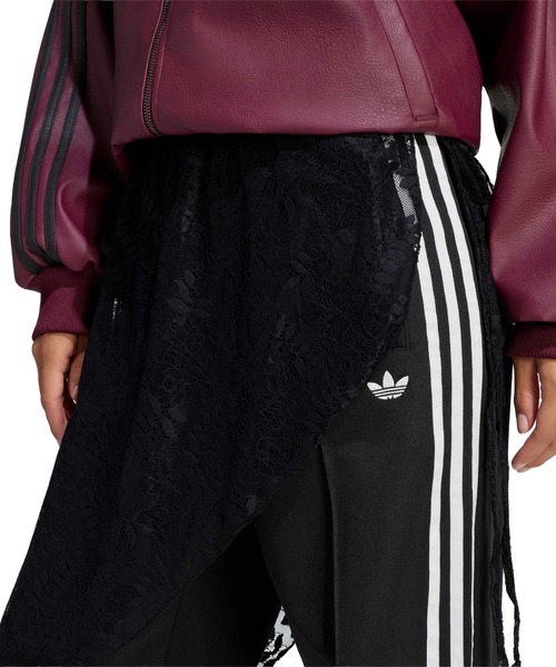 adidas(アディダス)の「adidas 2IN1 FIREBIRD LOOSE TRACK TROUSERS WITH LACE SKIRT / アディダス レーススカート付き 2イン1 ファイヤーバード ルーズ トラックパンツ(その他パンツ・レディース・ブラック・S/M/L)」の2枚目の写真