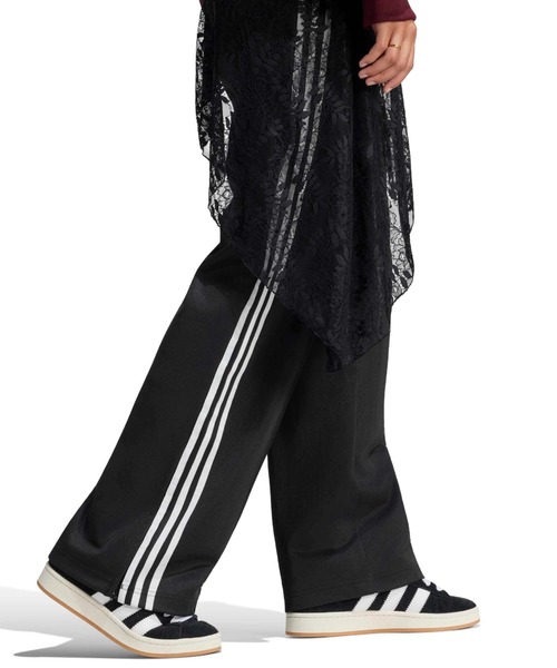 adidas(アディダス)の「adidas 2IN1 FIREBIRD LOOSE TRACK TROUSERS WITH LACE SKIRT / アディダス レーススカート付き 2イン1 ファイヤーバード ルーズ トラックパンツ(その他パンツ・レディース・ブラック・S/M/L)」の6枚目の写真