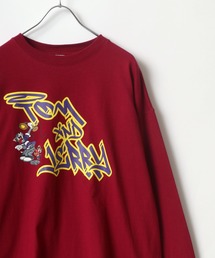 Tom＆Jerry（トムアンドジェリー）の「Tom＆Jerry DISCUS/トム＆ジェリー タギングプリント ビッグシルエット ロゴ ロンT（Tシャツ/カットソー・メンズ）」