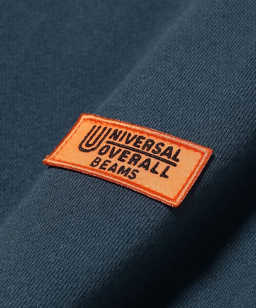 UNIVERSAL OVERALL(ユニバーサルオーバーオール)の「【別注】UNIVERSAL OVERALL / ロゴ クルーネック スウェット(スウェット・メンズ・シルバー/ブラック/ライトブルー/ホワイト系その他7/グリーン/ネイビー・SMALL/LARGE/X-LARGE/MEDIUM)」の8枚目の写真