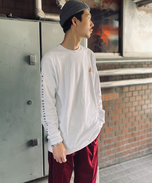 KELTY(ケルティ)の「【KELTY/ケルティ】GLOSTER別注 袖ロゴプリント ロングスリーブTシャツ(Tシャツ/カットソー・メンズ・ホワイト/チャコールグレー/ベージュ/オレンジ・MEDIUM/LARGE)」の2枚目の写真
