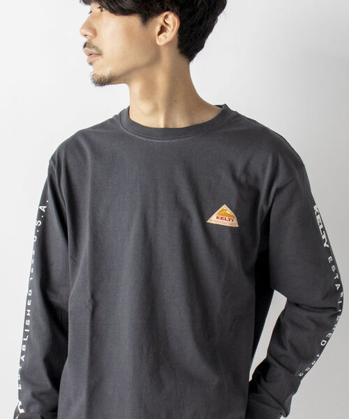 KELTY(ケルティ)の「【KELTY/ケルティ】GLOSTER別注 袖ロゴプリント ロングスリーブTシャツ(Tシャツ/カットソー・メンズ・ホワイト/チャコールグレー/ベージュ/オレンジ・MEDIUM/LARGE)」の21枚目の写真