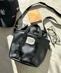 FREDRIK PACKERS（フレドリックパッカーズ）の「FREDRIK PACKERS フレドリックパッカーズ  / DRAWSTRING MINI TOTE ECO LEATHER（ショルダーバッグ）」
