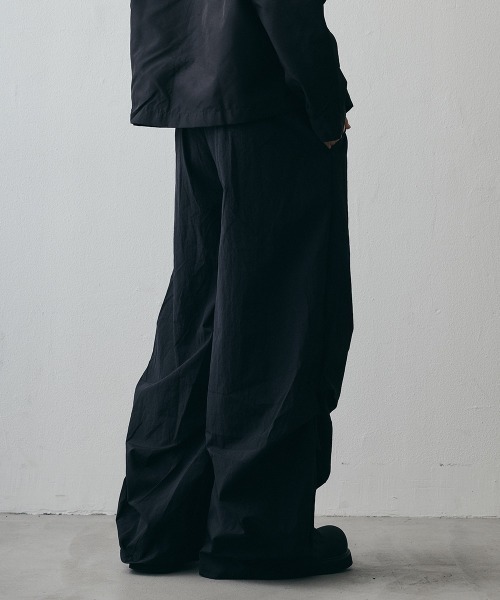 Shoowtime(ショウタイム)の「Curved Seam Wide Nylon Pants / カーブシームワイドナイロンパンツ(その他パンツ・メンズ・ブラック・X-LARGE/LARGE/MEDIUM)」の9枚目の写真