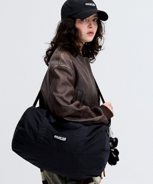 MACNI（マクニ）の「ROUND DUFFLE CROSS BAG BLACK（ボストンバッグ）」