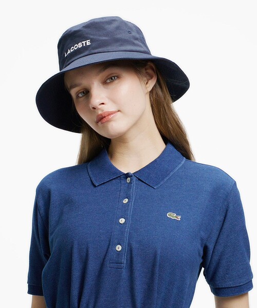 LACOSTE(ラコステ)の「インディゴ鹿の子ポロドレス / フレアワンピース(ワンピース・レディース・ネイビー/ブルー・40/36/38/34)」の3枚目の写真