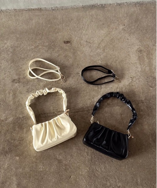 t a r o s u(タロス)の「kusyukusyu 2way bag/クシュクシュ2ウェイバッグ(ハンドバッグ・レディース・ホワイト/ブラック・FREE)」の1枚目の写真