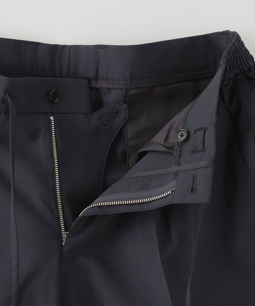 UNITED ARROWS(ユナイテッドアローズ)の「トロピカル スリム テーパード サイドシャーリング パンツ(スラックス・メンズ・ネイビー/グレー・48/46/44/50/52)」の14枚目の写真