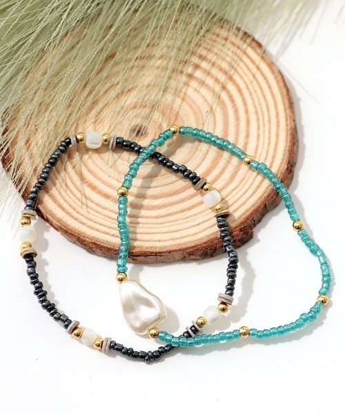 チチカカ(チチカカ)の「バロックパールブレスレット(ブレスレット・レディース・オレンジ/ブルー・FREE)」の1枚目の写真