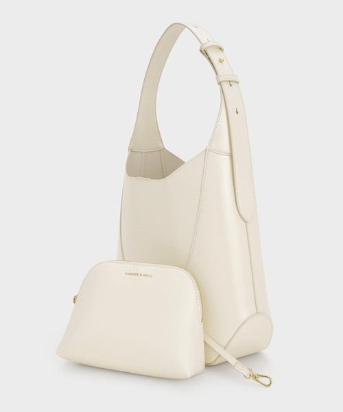 CHARLES & KEITH(チャールズ & キース)の「Sigrid シグリッド ホーボーバッグ(ショルダーバッグ・レディース・クリーム/ダークパープル/スミクロ・L)」の5枚目の写真