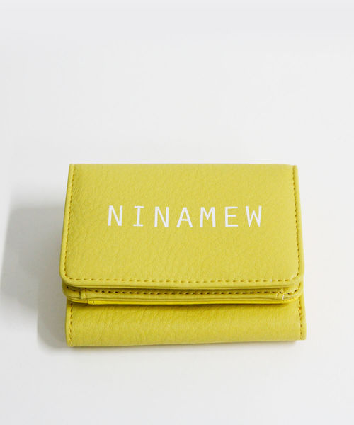 nina mew(ニーナミュウ)の「Ninamewロゴ折り畳み財布(財布)」|イエロー