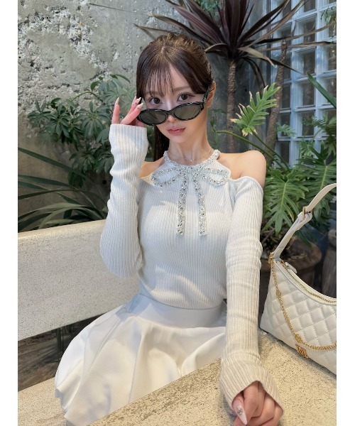 Darich（ダーリッチ）の「リボンビジューアメスリニットトップス