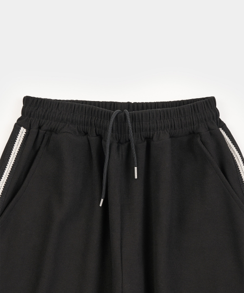 EXCONTAINER(エックスコンテナ)の「ワッフルサイドライントラックパンツ (BLACK)(スウェットパンツ・メンズ・その他・MEDIUM/LARGE/X-LARGE/SMALL)」の4枚目の写真