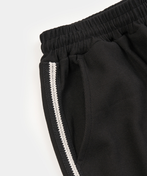 EXCONTAINER(エックスコンテナ)の「ワッフルサイドライントラックパンツ (BLACK)(スウェットパンツ・メンズ・その他・MEDIUM/LARGE/X-LARGE/SMALL)」の5枚目の写真