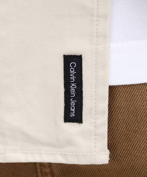 Calvin Klein(カルバン・クライン)の「ストライプ CK バック グラフィック オーバーシャツ(シャツ/ブラウス・メンズ・ホワイト・S/M/XL/L)」の5枚目の写真