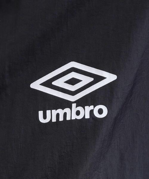 UMBRO(アンブロ)の「◆【umbro/アンブロ】シアーナイロン5分袖ZIPアップブルゾン(ブルゾン・レディース・ブラック/アイボリー・99)」の4枚目の写真