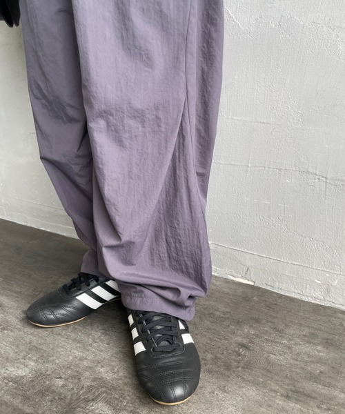 UMBRO（アンブロ）の「[UMBRO/アンブロ] 別注 ナイロントラックパンツ（その他パンツ・レディース・グレー/ネイビー・XL/L/M/S）」の5枚目の写真