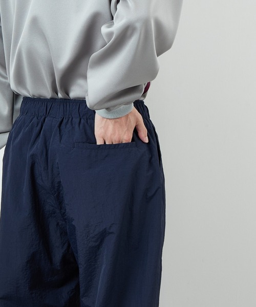 UMBRO（アンブロ）の「[UMBRO/アンブロ] 別注 ナイロントラックパンツ（その他パンツ・レディース・グレー/ネイビー・XL/L/M/S）」の22枚目の写真