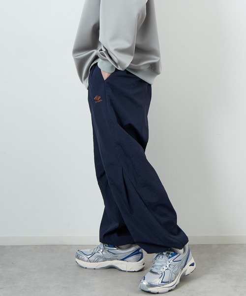 UMBRO（アンブロ）の「[UMBRO/アンブロ] 別注 ナイロントラックパンツ（その他パンツ・レディース・グレー/ネイビー・XL/L/M/S）」の12枚目の写真