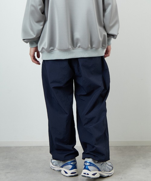 UMBRO（アンブロ）の「[UMBRO/アンブロ] 別注 ナイロントラックパンツ（その他パンツ・レディース・グレー/ネイビー・XL/L/M/S）」の13枚目の写真