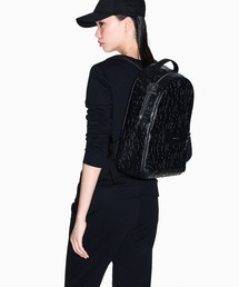 ARMANI EXCHANGE（アルマーニエクスチェンジ）の「【A|X アルマーニ エクスチェンジ】＜オンライン限定＞オールオーバーエンボスロゴ バックパック（グレイン)（バックパック/リュック）」