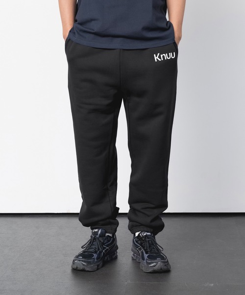 Knuu(ヌウ)の「Logo Heavy Sweat Pants(スウェットパンツ・メンズ・ホワイト/ブラック/ネイビー/杢グレー・MEDIUM/LARGE/X-LARGE)」の1枚目の写真