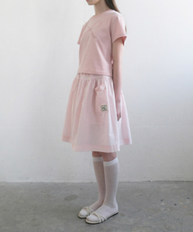 UBEIGE（ユーベイジ）の「Seersucker Ribbon Pocket Skirt (Pink)（スカート）」