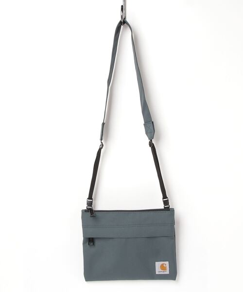 Carhartt WIP(カーハートダブリューアイピー)の「VERNON STRAP BAG(ショルダーバッグ・メンズ・カーキ/ダークネイビー/ライトブラウン・ONE SIZE)」の1枚目の写真