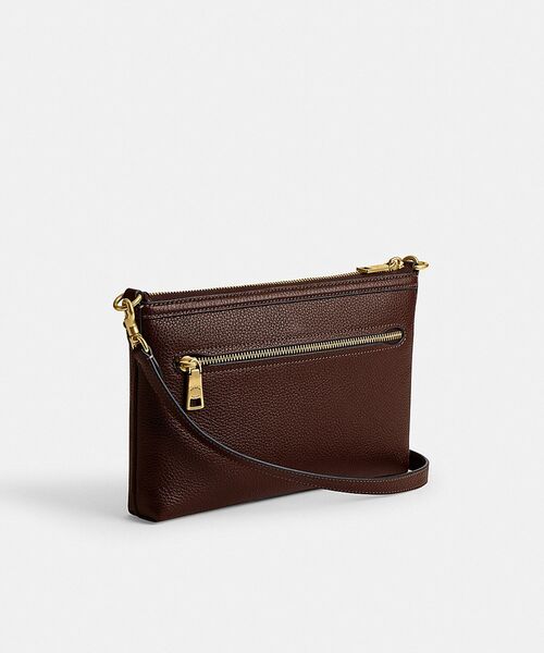 COACH（コーチ）の「レガシー ジップ トップ クロスボディ バッグ