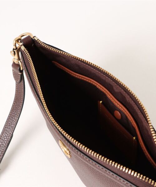 COACH（コーチ）の「レガシー ジップ トップ クロスボディ バッグ