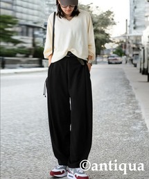 antiqua（アンティカ）の「コーデセット  カシミヤタッチドルマンニット×カッティングテーパードパンツ（セットアップ）」