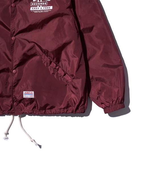 AECA(エイカ)の「AECA RECORD SHOP NYLON COACH JACKET-BURGUNDY(ナイロンジャケット・メンズ・その他・SMALL/MEDIUM/LARGE)」の7枚目の写真