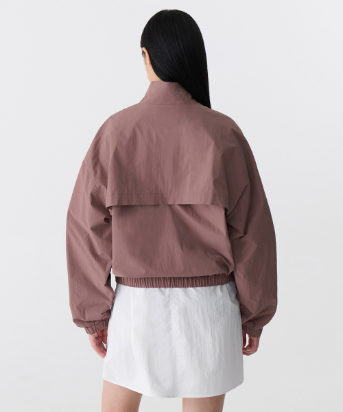 MUSINSA STANDARD WOMAN（ムシンサスタンダードウーマン）の「ウィメンズオーバーサイズハイネックウインドブレーカージャケット[レッドビン]（ナイロンジャケット・レディース・その他・SMALL/MEDIUM/LARGE/X-SMALL）」の6枚目の写真