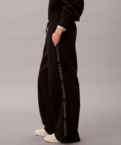 Calvin Klein(カルバン・クライン)の「ロングスウェットパンツ(スウェットパンツ・レディース・グレー/ブラック・M/S/XS)」の19枚目の写真
