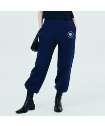 NCOVER（エヌカバー）の「ROMAN TYPO LOGO TRAINING PANTS-NAVY（スウェットパンツ）」
