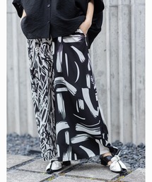 OSMOSIS（オズモーシス）の「【WEB限定アイテム】プリント切替フレアーパンツ（その他パンツ）」