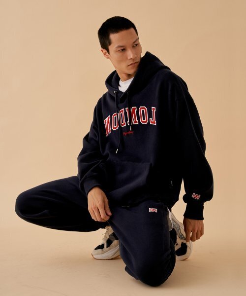 PAPERBOY(ペーパーボーイ)の「ロンドンフードパーカー-ネイビー(パーカー・レディース・ネイビー・MEDIUM/SMALL/X-LARGE/LARGE)」の1枚目の写真