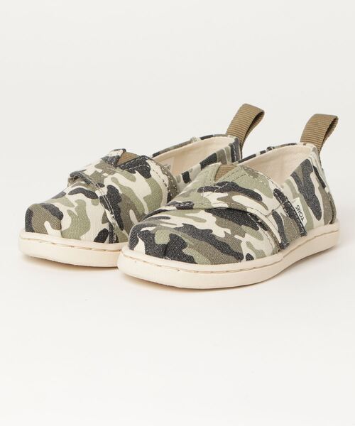 TOMS(トムス)の「タイニー ダーティー オリーブ カモフラージュプリント タイニー アルパルガータ(スリッポン・キッズ・オリーブ・17.5cm/14.0cm/17.0cm/16.0cm/15.0cm/13.0cm)」の1枚目の写真