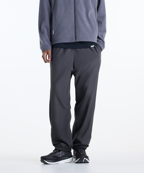 NEW BALANCE(ニューバランス)の「ウーブントラックパンツ 裏トリコット起毛(スウェットパンツ・メンズ・グレイッシュブルー/チャコールグレー・SMALL/XX-LARGE/X-LARGE/LARGE/MEDIUM)」の1枚目の写真