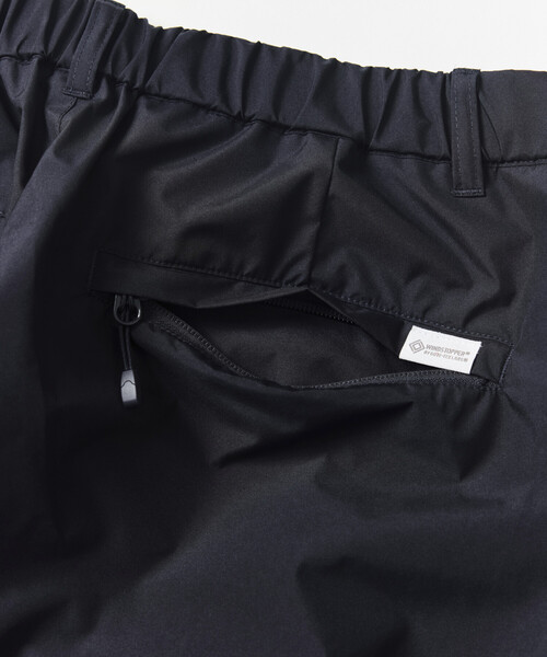 +phenix(プラスフェニックス)の「+phenix/プラスフェニックス 別注 GORE-TEX WINDSTOPPER PACKABLE SLACKS【セットアップ対応】/ゴアテックス ウインドストッパー パッカブル スラックス(その他パンツ・メンズ・ネイビー/チャコールグレー/ブラック・SMALL/MEDIUM/LARGE)」の7枚目の写真
