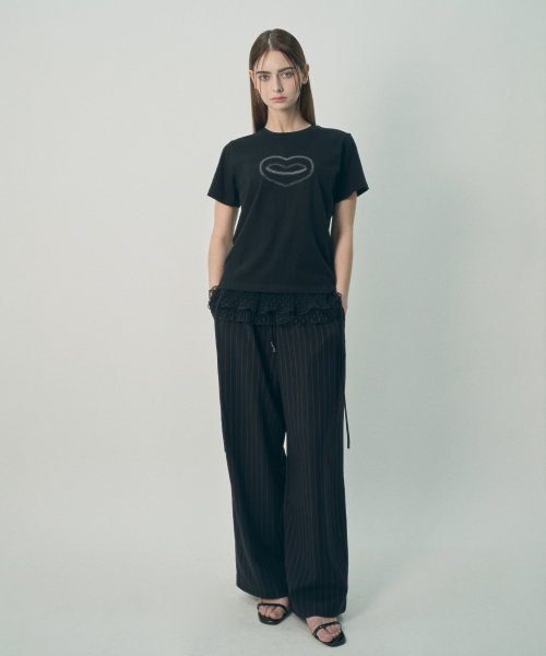 MIHEV（ミヘブ）の「ミヘブグラフィックシンボルTシャツブラック（Tシャツ/カットソー・レディース・その他・MEDIUM/LARGE）」の2枚目の写真
