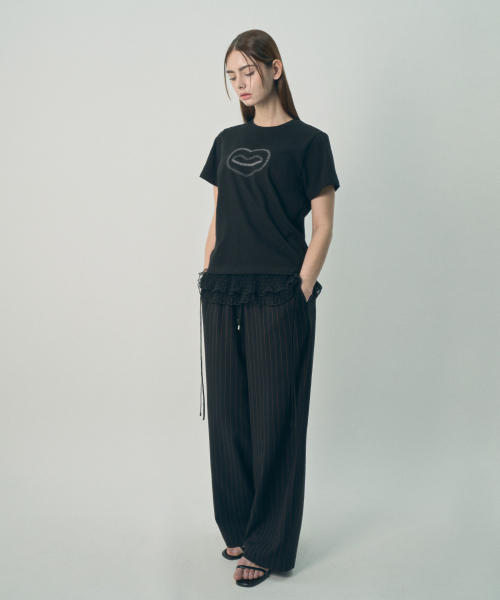 MIHEV（ミヘブ）の「ミヘブグラフィックシンボルTシャツブラック（Tシャツ/カットソー・レディース・その他・MEDIUM/LARGE）」の3枚目の写真