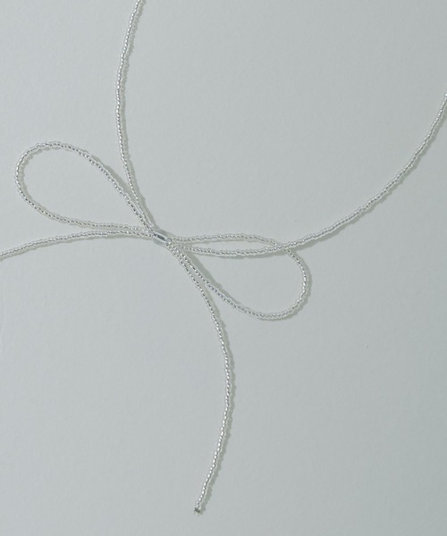 PAIRMANON COEUR（ペアマノンクール）の「【PAIRMANON COEUR】ビーズ リボンモチーフネックレス（ネックレス・キッズ・ブラック/グレー・FREE）」の7枚目の写真